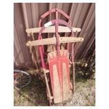 2 vintage sleds