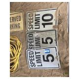 3 plastic speed limit signs