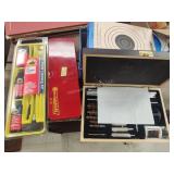 Gun cleaning kits and targets