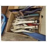 2 vise grips and tools