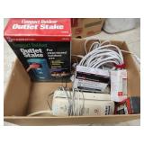 Outlet stake, outlets and other