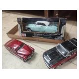 2 die cast and 1 plastic toy car