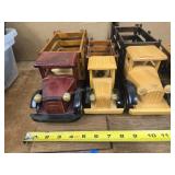 3 wooden trucks