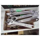 Adjustable wrenches