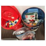 Two containers with blocks and other toys