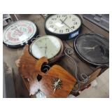5 clocks and barometer