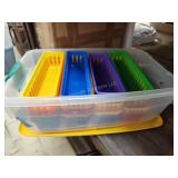Container of plastic trays