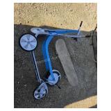 2 scooters and skate board