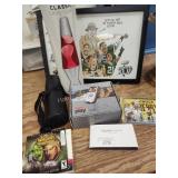 Lava lamp, poster, camera and other