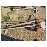 Post diggers, pickaxe and scraper