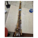 Cane poles and 1 ice fishing poles with reel