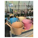 4 hanging watering can planters