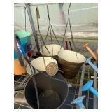 4 hanging watering can planters