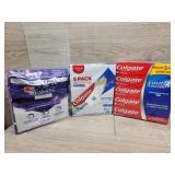 2 packs of Colgate toothpaste 1 pack of Crest