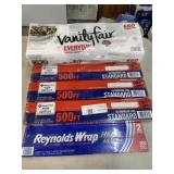 4 packages aluminum foil and bag of napkins