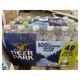 Box and pack of deer park water