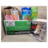 1 box of portion cups 1 pack of table pans 1 box