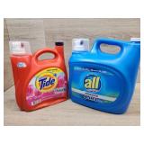 1 bottle of Tide laundry detergent 1 bottle of