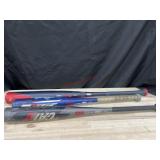 3 baseball bats various sizes