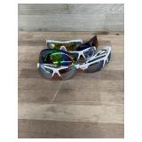 6 pairs of Rawlings and under armour sunglasses
