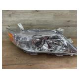 Left vehicle headlight