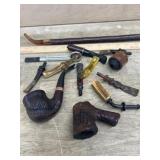 Bag of pipe stems/ pipe bowls and cracked pipe