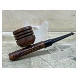 Carved pipe with removable bowl and dark stem