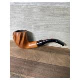 Light color carved pipe with clack stem