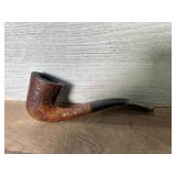 Carved pipe with vulcanite stem