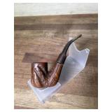 Carved bowl pipe with vulcanite stem