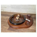 Amber ashtray on wood base with pipe stand