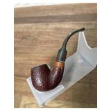 Carved egg bowl pipe with black stem