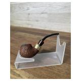 Carved pipe marked Nording on brass color ring