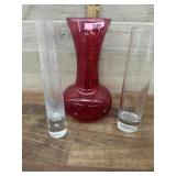 Red vase and 2 clear bud vases