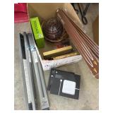 Box of picture frames candles and wiper blades
