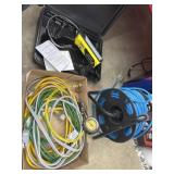 Box of extension cords and gas leak detector and