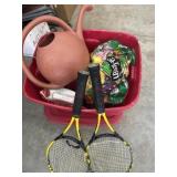 Tote of yard and garden water can, plant food