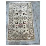 32x52 inch Tan and brown throw rug