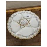 Haviland oyster plate with gold trim