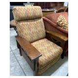 Tan and brown push back recliner