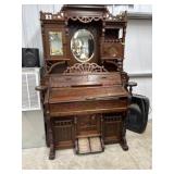Ornate burl wood pump organ