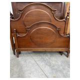 Antique bed frame with turned knobs