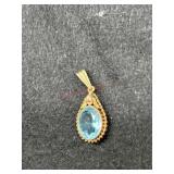 10K MARKED PENDANT WITH BLUE STONE
