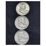 THREE 1954 FRANKLIN HALF DOLLARS