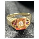 14K RING WITH 2 RED STONES, AND ONE DIAMOND??/