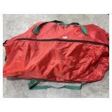 Siver Christmas tree and holiday garland in tree