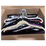 Box of velvet and plastic hangers