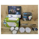 Box of light bulbs, new wall lamp and strip