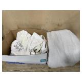 Grey blanket and towels