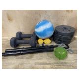 Trash can with hand weights and weight ball